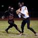 Milan senior defensive lineman Marquise Cook attempts to sack Tecumseh senior quarterback Ben Dreslinski on Friday. Daniel Brenner I AnnArbor.com